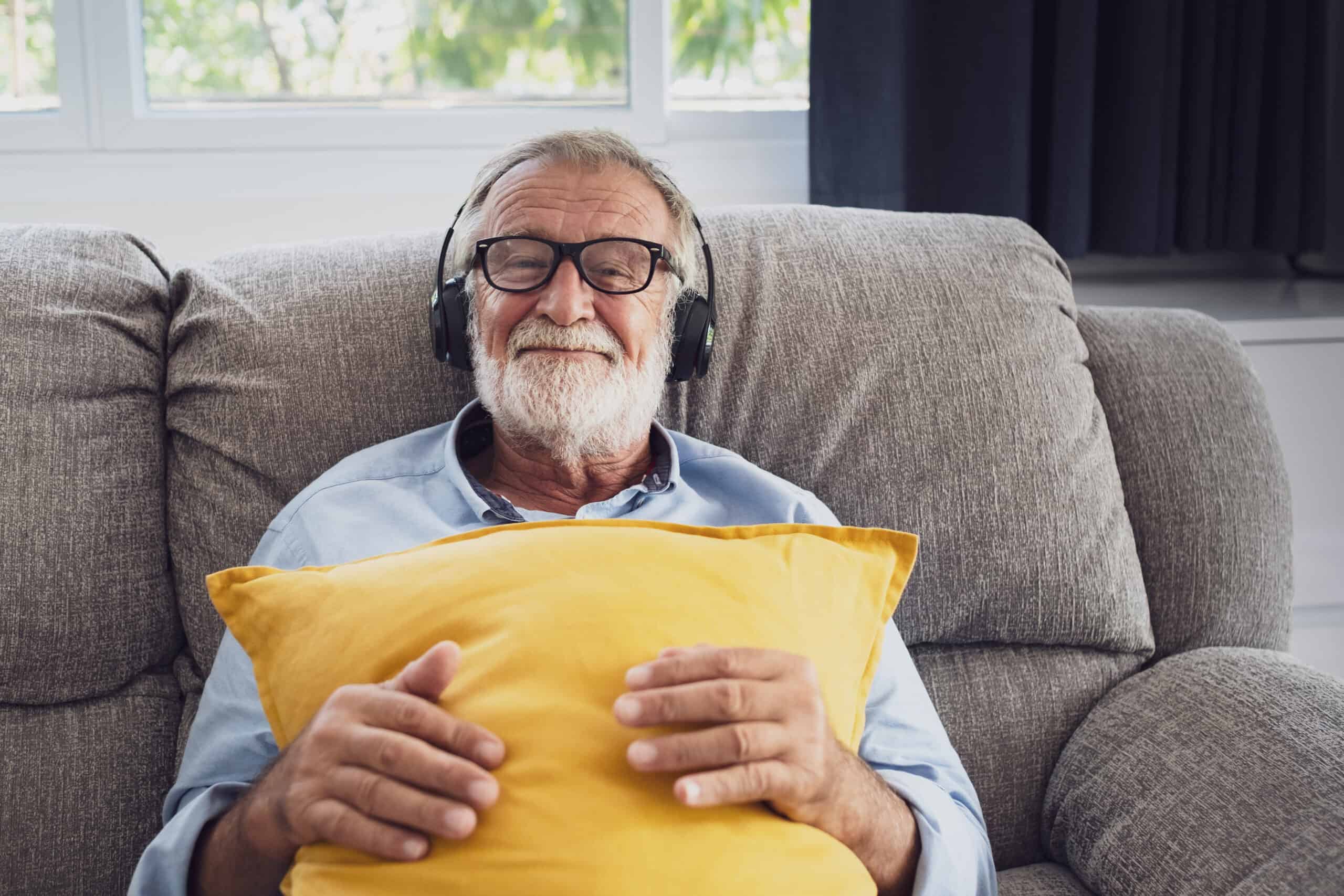 Senior man listenting to music